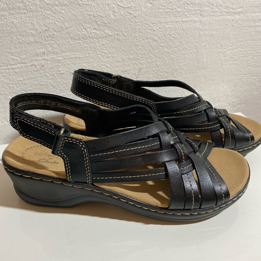 Brand new Clark’s black sandals, size 7